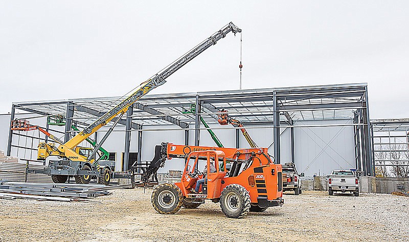 A crew from Septagon Construction works Nov. 17, 2021, on the loading dock portion of the new 55,000-square foot freezer at Graves Menu Maker Foods on Big Horn Drive in the Apache Flats area west of Jefferson City, Mo.
