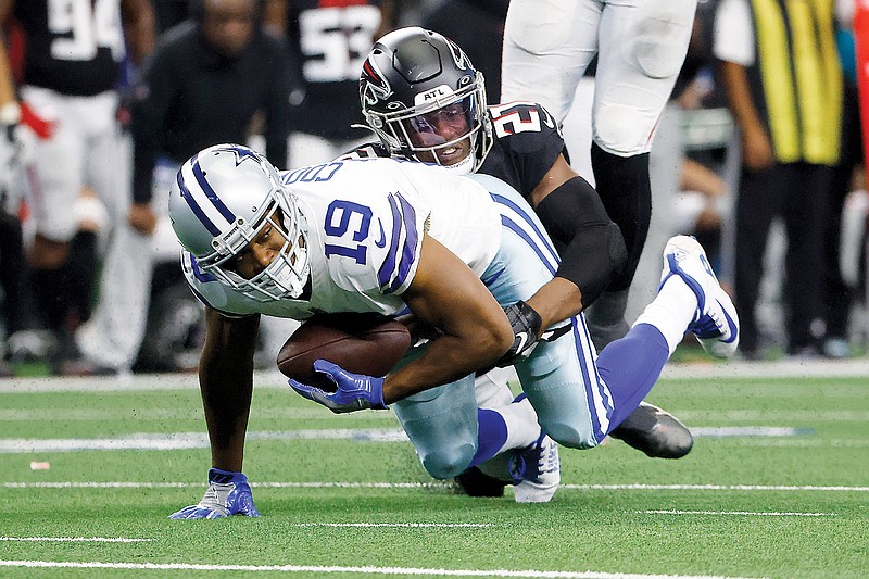 Cowboys wide receiver Amari Cooper catches a pass during last Sunday's game against the Falcons in Arlington, Texas
