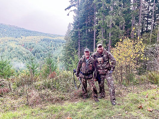 Nathan McLeod (right) and Uncle Steve enjoying a reunion hunt for coastal black-tail deer near Clatskanie, Ore. 