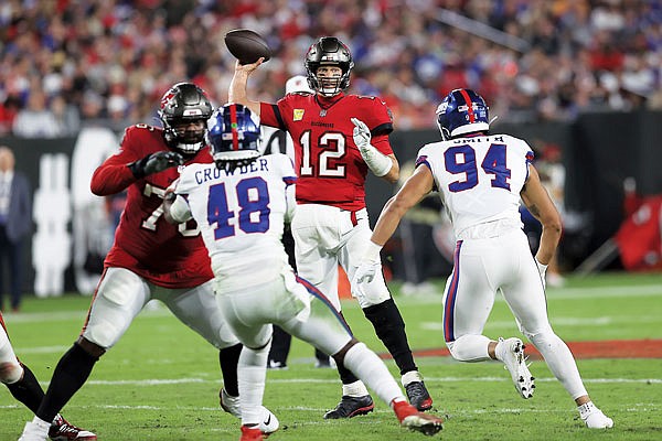 Buccaneers quarterback Tom Brady throws a pass during Monday night's game against the Giants in Tampa, Fla.