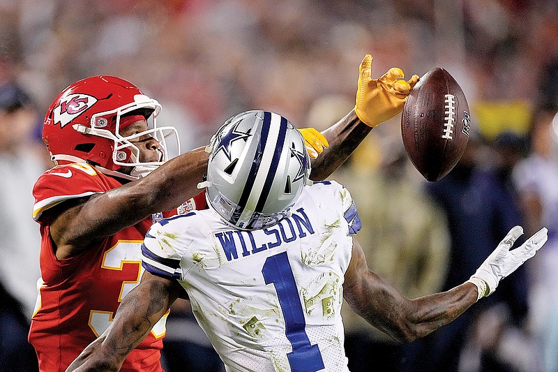 Chiefs cornerback Charvarius Ward breaks up a pass intended for Cowboys wide receiver Cedrick Wilson during the second half of Sunday's game at Arrowhead Stadium.