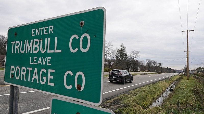 A car enters Trumbull County, Wednesday, in this photo from Nov. 17, 2021, near Warren, Ohio. Three retail pharmacy chains recklessly distributed massive amounts of pain pills in two Ohio counties, a federal jury said Tuesday, Nov. 23, 2021, in a verdict that could set the tone for U.S. city and county governments that want to hold pharmacies accountable for their roles in the opioid crisis. (AP Photo/Tony Dejak)