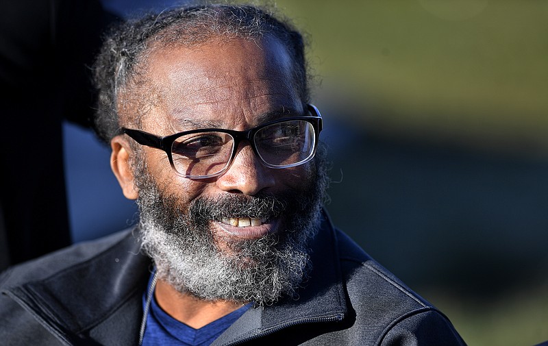 Kevin Strickland, 62, managed a smile while talking to the media after his release from prison, Tuesday, Nov. 23, 2021, in Cameron, Mo. Strickland, who was jailed for more than 40 years for three murders, was released from prison Tuesday after a judge ruled that he was wrongfully convicted in 1979. (Rich Sugg/The Kansas City Star via AP)