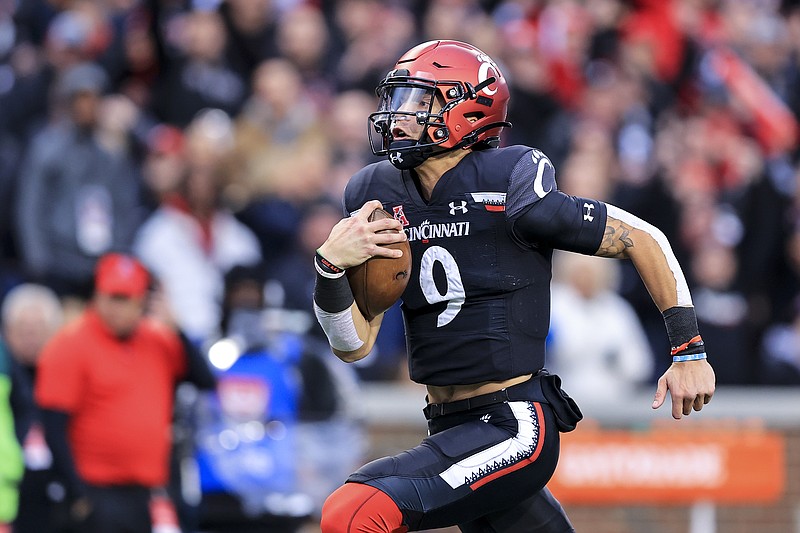 Cincinnati quarterback Desmond Ridder runs the ball for a touchdown during last Saturday's game against SMU in Cincinnati. The Bearcats won 48-14.