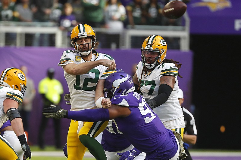 Vikings defensive end Everson Griffen hits Packers quarterback Aaron Rodgers during last Sunday's game in Minneapolis.