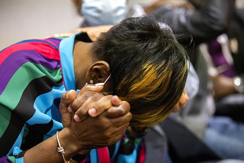 Ahmaud Arbery's mother, Wanda Cooper-Jones breaks down after the jury convicted Travis McMichael in the Glynn County Courthouse, Wednesday, Nov. 24, 2021, in Brunswick, Ga. (AP Photo/Stephen B. Morton, Pool)