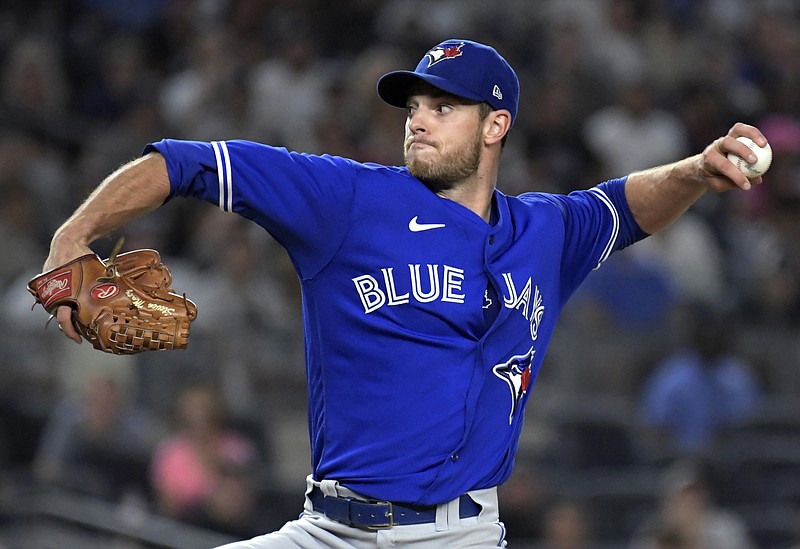 In this Sept. 7 file photo, Blue Jays pitcher Steven Matz throws to a Yankees batter during the third inning of a game at Yankee Stadium in New York. Mets owner Steve Cohen criticized Matz for reaching an agreement with the Cardinals rather than New York.