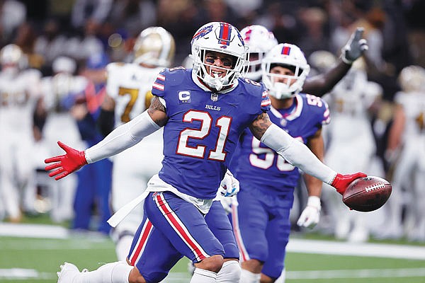 Bills free safety Jordan Poyer celebrates his interception in the second half of Thursday night's game against the Saints in New Orleans.