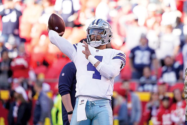 Cowboys quarterback Dak Prescott warms up before last Sunday's game against the Chiefs at Arrowhead Stadium.