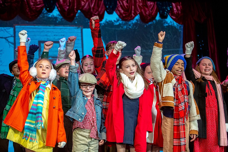 Kids sing "When You're a Wimp" during a rehearsal of "A Christmas Story, the Musical" on Tuesday, Nov. 30, 2021 at Capital City Productions in Jefferson City, Mo.