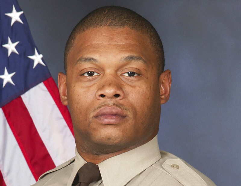 This photo provided by St. Louis County Police Department shows Detective Antonio Valentine. The St. Louis County police detective died in the line of duty and a suspect he was trying to stop also died in a head-on collision of their vehicles. The crash happened Wednesday, Dec. 1, 2021, in north St. Louis County after officers with the department's drug unit tried to stop a car that had been reported stolen, police said. (St. Louis County Police Department via AP)