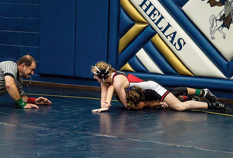 Lydia Hudson of Jefferson City works for a pin during last season's Central Missouri Activities Conference Tournament at Rackers Fieldhouse.