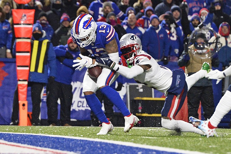 Bills wide receiver Gabriel Davis hauls in a pass from Josh Allen for a touchdown with Patriots cornerback Jalen Mills defending during the first half of Monday night's game in Orchard Park, N.Y.