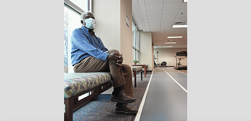Ed Coleman, a commissioner for the North Little Rock Hayes Senior Center, sits next to the walking track inside the Hayes Senior Center on Wednesday, March 17, 2021.
(Arkansas Democrat-Gazette/Staci Vandagriff)
