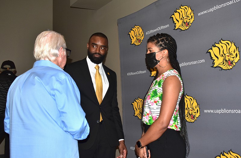 New UAPB men's basketball head coach Solomon Bozeman, center, was introduced at a press conference, Tuesday, June 15, 2021. (Pine Bluff Commercial/I.C. Murrell)