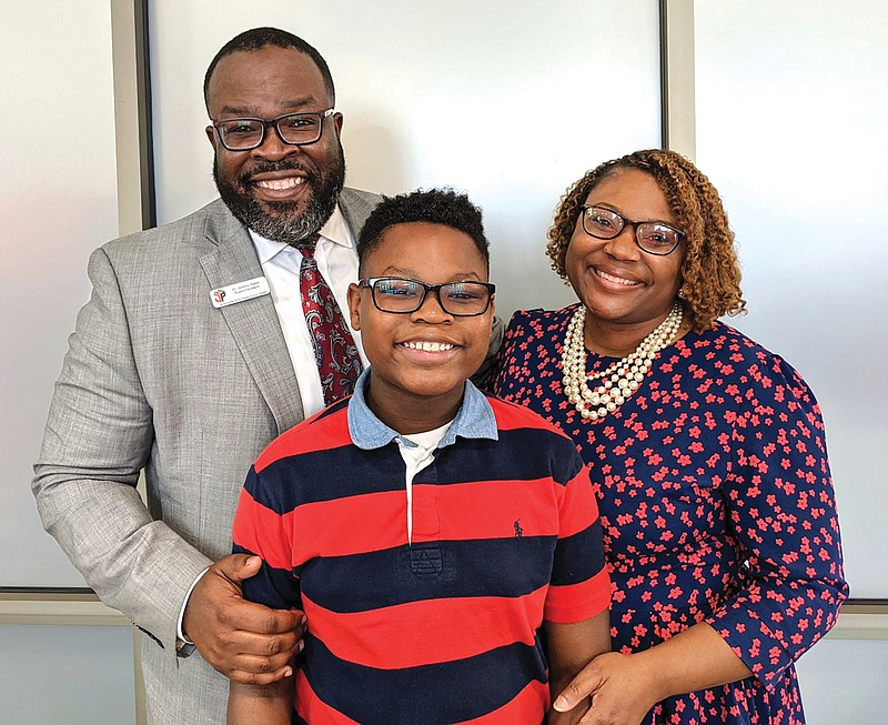 Jeremy Owoh, pictured here with his wife, Katrina, and their 13-year-old son, Jaxon, is the new superintendent for the Jacksonville North Pulaski School District. Owoh worked as an assistant superintendent for the district when it detached from the Pulaski County Special School District in 2016.