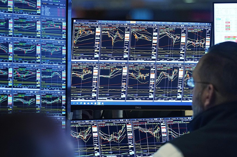 Specialist Anthony Matesic works at his post on the floor of the New York Stock Exchange, Monday, Oct. 18, 2021. Stocks wobbled in midday trading on Wall Street Monday as the market's momentum slows following its best week since July. (AP Photo/Richard Drew)