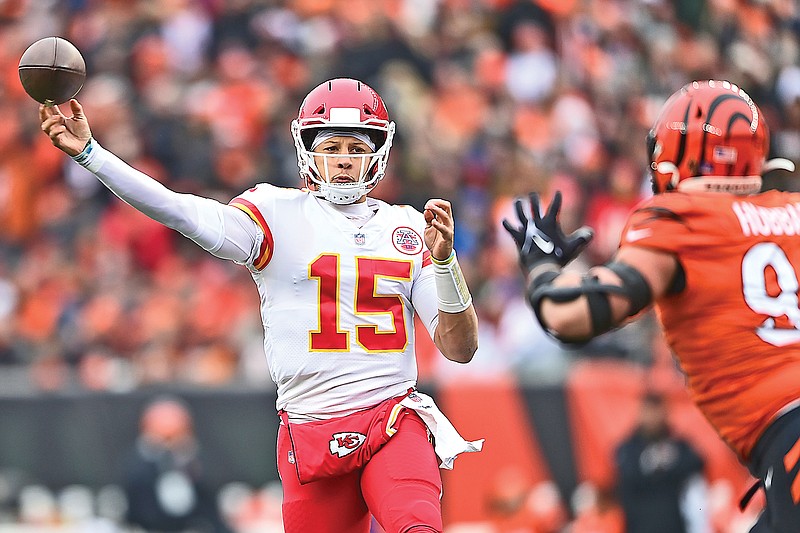 Chiefs quarterback Patrick Mahomes passes the ball against the Bengals during the first half of Sunday’s game in Cincinnati. (Associated Press)