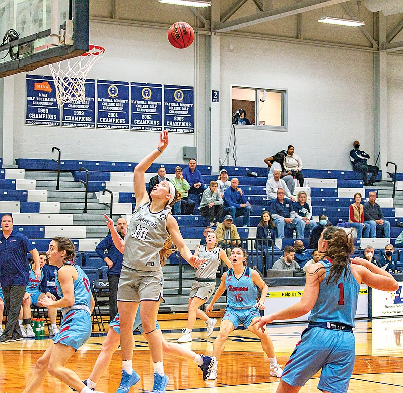 Lincoln’s Mercy Gonzalez waits for a rebound during the first half of Thursday’s game against Newman at Jason Gym. (Ken Barnes/News Tribune)