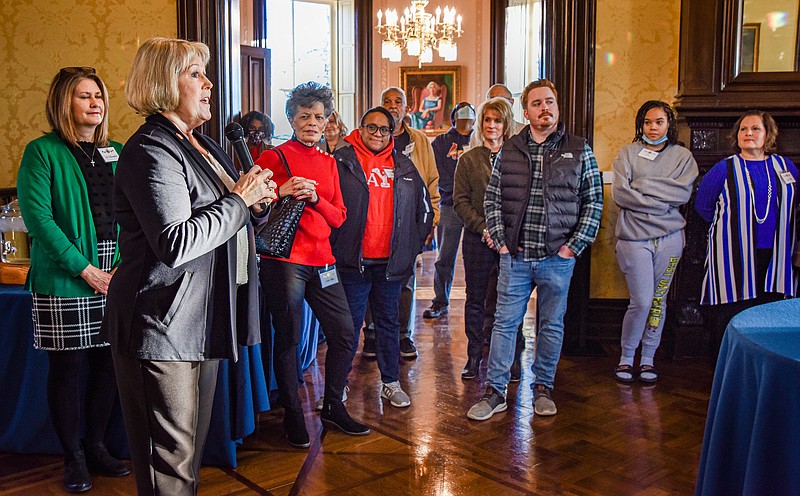 First lady Teresa Parson, left, welcomes guests Thursday to the Governor’s Mansion in Jefferson City as she and second lady Claudia Kehoe host an event for local mentors from Jefferson City Big Brothers Big Sisters. Standing in the background left is Lee Knernschield, executive director of BBBS. (Julie Smith/For the FULTON SUN)
