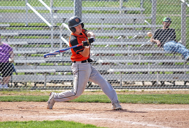 New Bloomfield’s Lucas Buscher swings at a pitch during Saturday’s game against St. Elizabeth at Haley Field. (Greg Jackson/For the Fulton Sun)