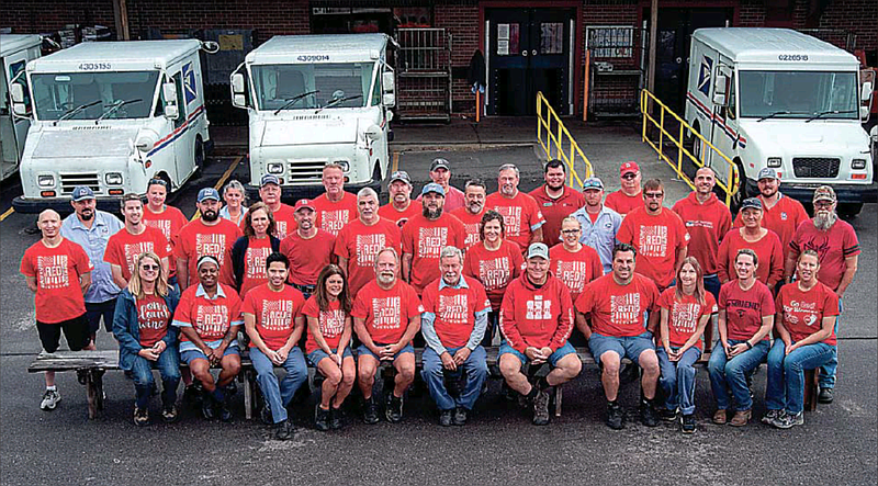 In a show of support for a fellow postal worker on active duty, many employees of the United States Post Office, Capitol View Station, wore matching shirts for Red Shirt Friday.