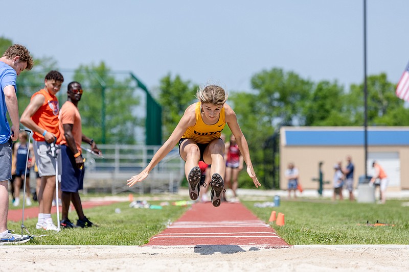 Fulton freshman Emmy Begemann glides through the air in the triple jump Saturday, May 14, 2022, in the Class 4 District 4 meet at North Point High School in Wentzville, Mo. (Courtesy of Alan Combs)