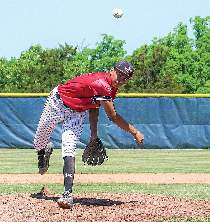 Jefferson City pitcher Jordan Martin delivers to the plate during Monday’s first-round game of the Class 5 District 5 Tournament against Camdenton at the American Legion Post 5 Sports Complex. (Julie Smith/News Tribune)