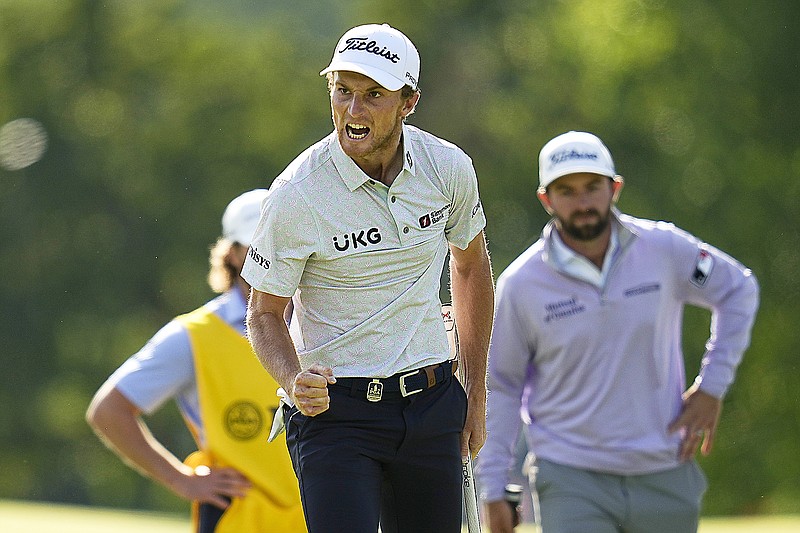 Will Zalatoris celebrates after a par save on the 18th hole during Sunday's final round of the PGA Championship at Southern Hills Country Club in Tulsa, Okla. (Associated Press)