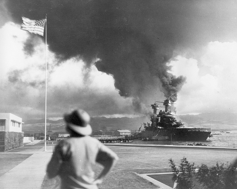 American ships burn during the Japanese attack on Pearl Harbor, Hawaii, in this Dec. 7, 1941, file photo. (AP Photo/File)