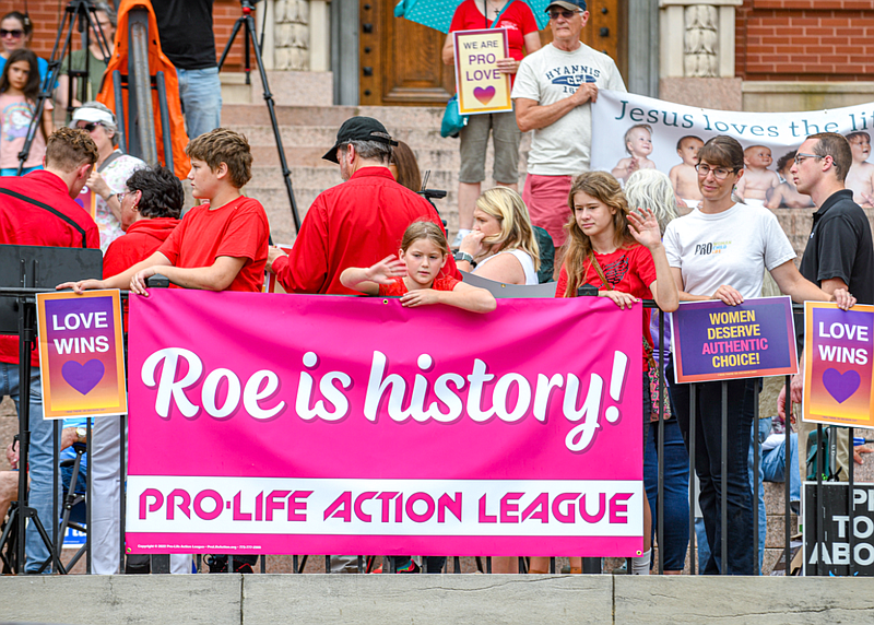 A small crowd gathered Friday on the steps of the Missouri Supreme Court to celebrate the overturning of the landmark Roe v. Wade abortion case
