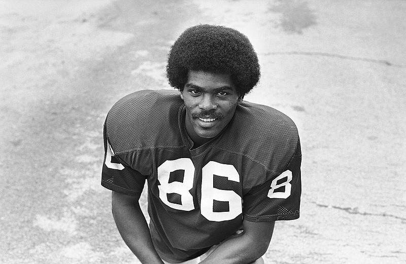 This August 1975 file photo shows St. Louis Cardinals football player Marlin Briscoe. Briscoe, the first Black starting quarterback in the American Football League, died Monday. His daughter, Angela Marriott, told the Associated Press that Briscoe, 76, died of pneumonia at a hospital in Norwalk, Calif. (Associated Press)