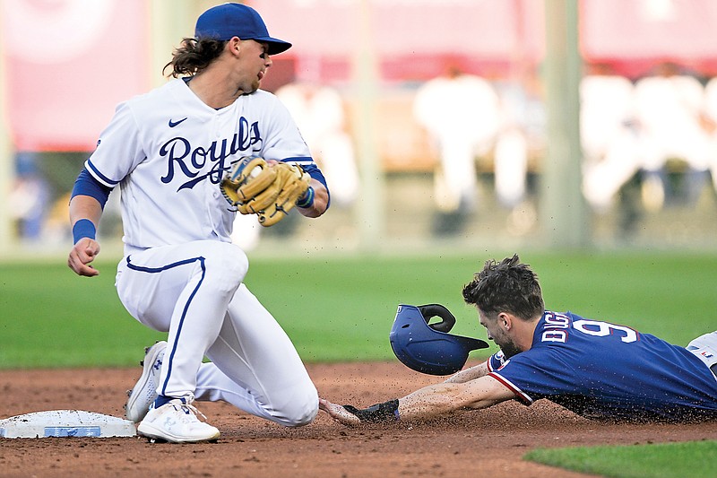 Steven Duggar of the Rangers is caught trying to steal second base by Royals shortstop Bobby Witt Jr. during the second inning of Tuesday night’s game at Kauffman Stadium in Kansas City. (Associated Press)