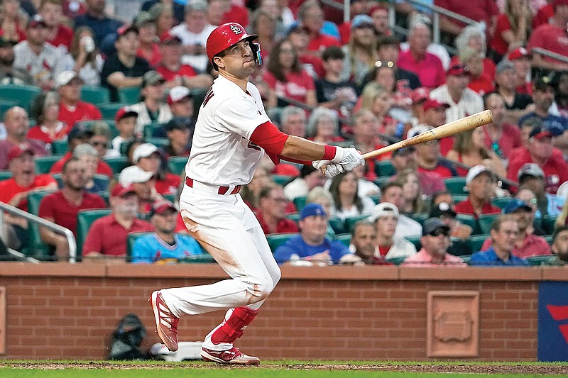 Dylan Carlson of the Cardinals hits a ground-rule double to score Tommy Edman during the fifth inning of Tuesday night’s game against the Marlins at Busch Stadium in St. Louis. (Associated Press)
