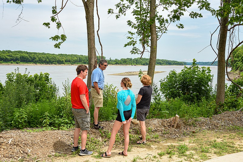 The Cox family from Wardsville visited Deborah Cooper Park at Adrian's Island Thursday to see the new park's features. Kaleb, left, and his siter, Chloe, second from right, joined their parents Terry and Carol, for a brief tour of the park and to stop and look out over the Missouri River, where they noticed a sand bar visible in the distance. The water level has dropped in recent weeks as drought conditions persist along the Missouri River Basin.