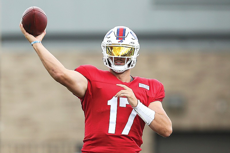 Bills quarterback Josh Allen throws during practice Saturday at the team’s training camp in Pittsford, N.Y. (Associated Press)