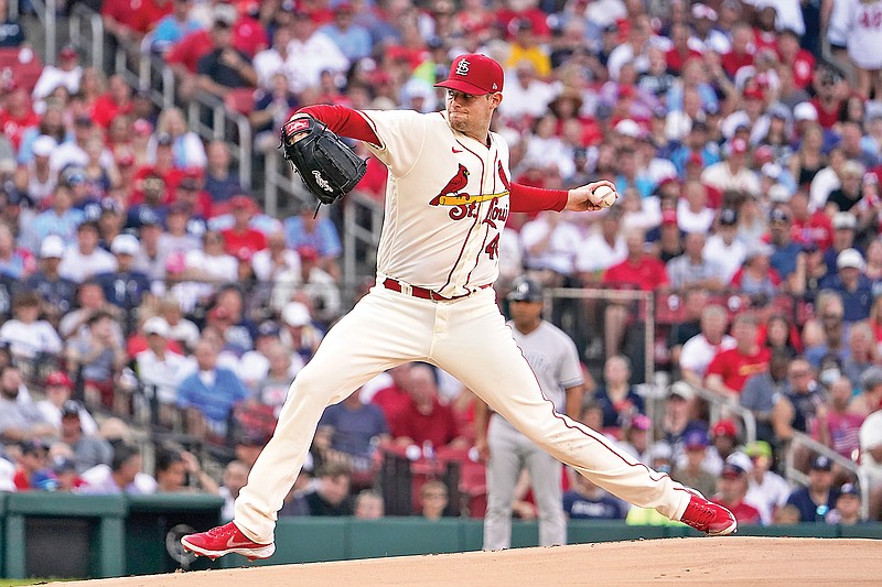 Cardinals pitcher Jordan Montgomery throws to the plate during the first inning of Saturday’s game against the Yankees at Busch Stadium in St. Louis. (Associated Press)