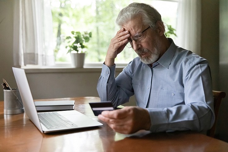 There are certain tactics con artists still use specifically to target older adults. / Getty Images/fizkes