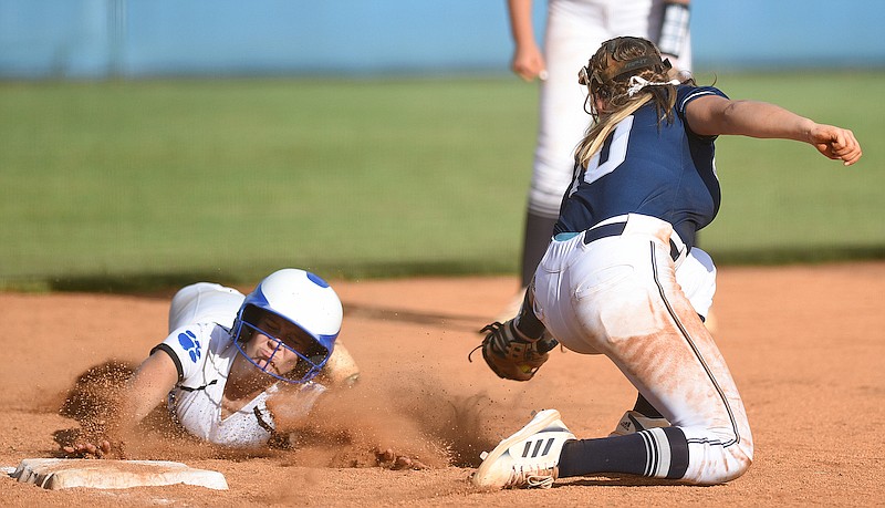 Staff photo by Matt Hamilton /  Ringgold (24) Hannah Scott is safe as Gordon Lee (10) Tenslee Wilson can't make the tag at third on Tuesday, August 30, 2022 at Ringgold High School.