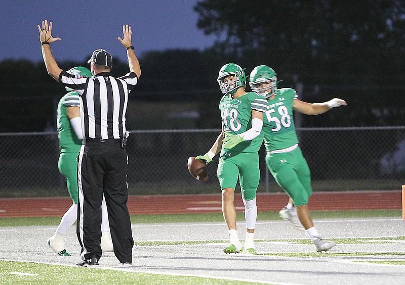 Blair Oaks wide receiver Adam Hall holds the ball after scoring a touchdown during Friday night’s game against Boonville at the Falcon Athletic Complex in Wardsville. (Gracen Gaskins/News Tribune)