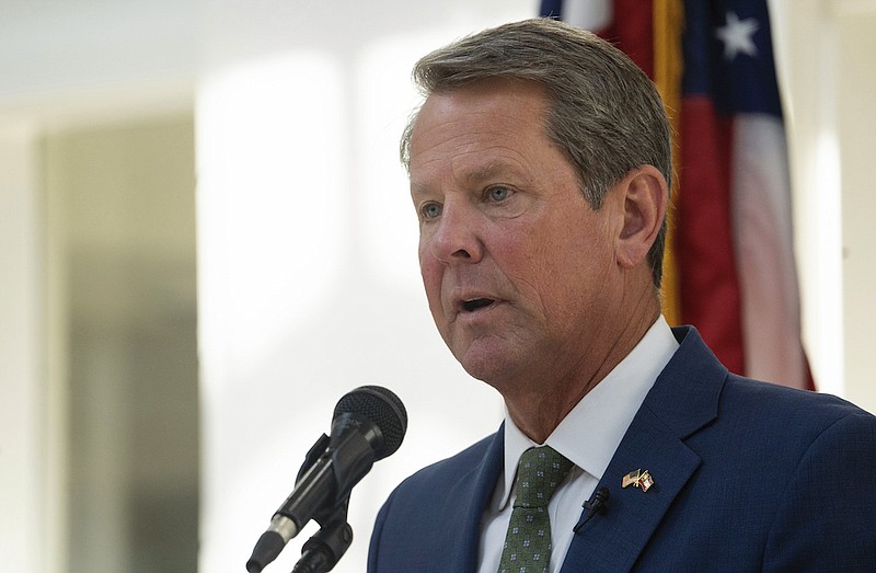 Georgia Gov. Brian Kemp speaks at Ola High School on July 29, 2022, in McDonough, Ga. On Friday, Sept. 23, 2022, the state Accounting Office reported that Georgia ran a surplus of more than $6 billion in the budget year that ended June 30, meaning the state's next governor and lawmakers could spend or give back billions. (AP Photo/Megan Varner, File)