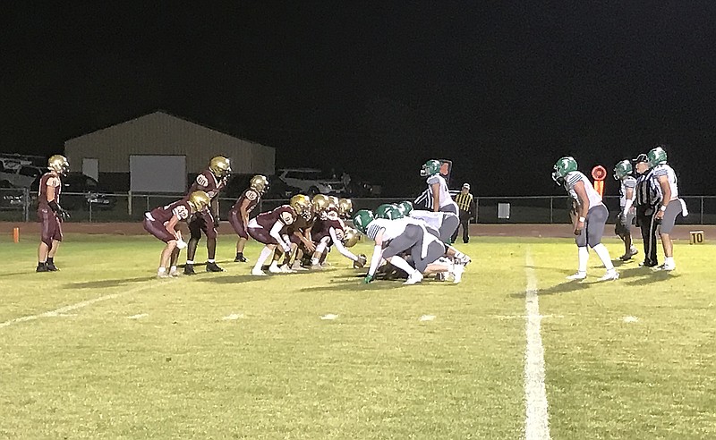 The Blair Oaks Falcons line up against the Eldon Mustangs prior to a punt attempt during the second quarter of Friday night's game at Victor Field in Eldon. (Greg Jackson/News Tribune)