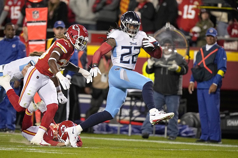 Titans running back Derrick Henry carries the ball during the first half of Sunday night's game against the Chiefs at Arrowhead Stadium in Kansas City. (Associated Press)