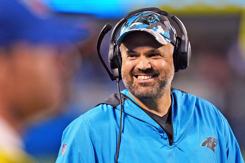 In this Aug. 26 file photo, Panthers coach Matt Rhule smiles during the first half of a preseason game against the Bills in Charlotte, N.C. (Associated Press)