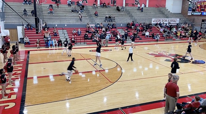 The Jefferson City Jays warm up prior to the start of Tuesday night's game against Warrensburg at Fleming Fieldhouse. (Kyle McAreavy/News Tribune)
