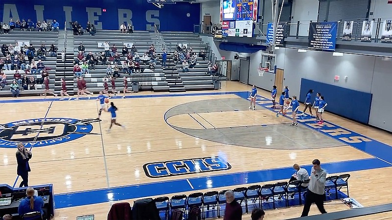 The Capital City Lady Cavaliers warm up on the court before the start of Tuesday night's game against Eldon at Capital City High School. (Kyle McAreavy/News Tribune)