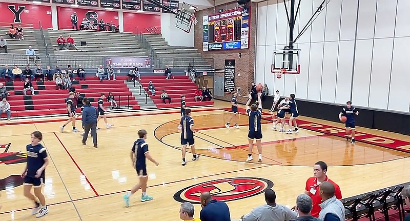 The Helias Crusaders warm up on the court before the start of Friday's third-place game against The Webb School, Tenn., in the Joe Machens Great 8 Classic at Fleming Fieldhouse. (Kyle McAreavy/News Tribune)