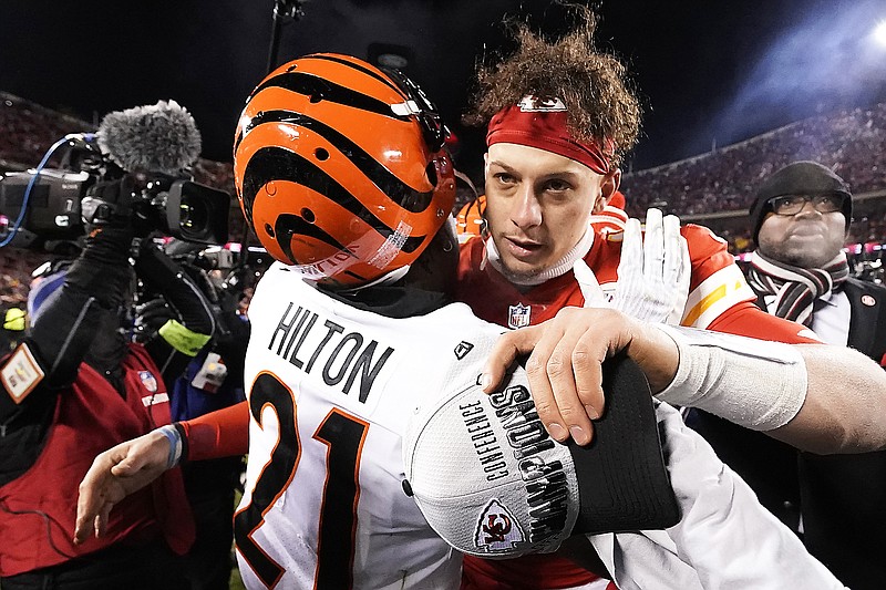 Bengals cornerback Mike Hilton speaks with Chiefs quarterback Patrick Mahomes after Sunday's AFC Championship Game at Arrowhead Stadium in Kansas City. (Associated Press)