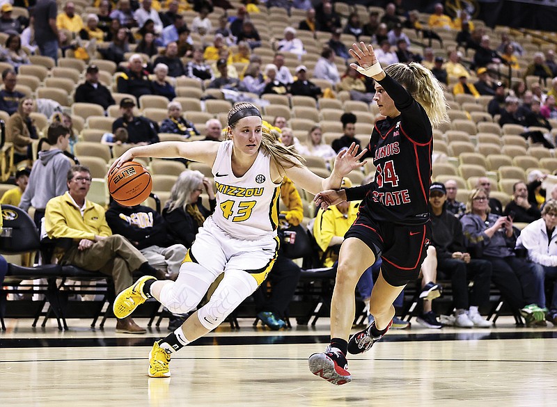 Missouri’s Hayley Frank dribbles the ball around Illinois State’s Paige Robinson during last Thursday night’s first-round game of the WNIT at Mizzou Arena. (Photo courtesy of Mizzou Athletics)