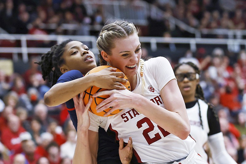 Mississippi guard Angel Baker and Stanford forward Cameron Brink vie for the ball during the first half of Sunday's NCAA Tournament second-round game in Stanford, Calif. (Associated Press)